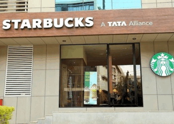 How can pooling complementary assets and resources through a Joint Venture strategic alliance help in co-creating value? 